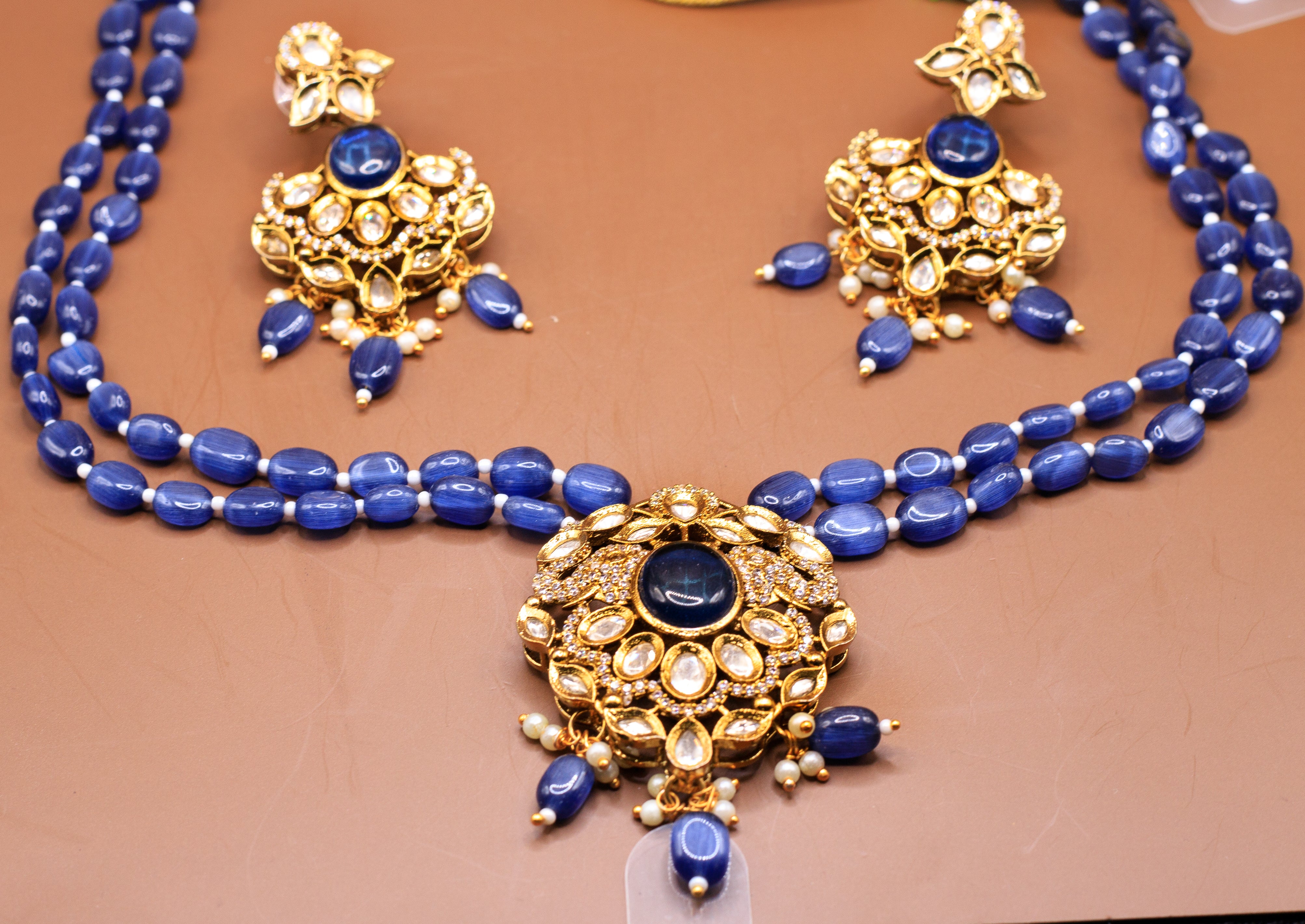 Beaded Necklace with  Polki pendant and earrings